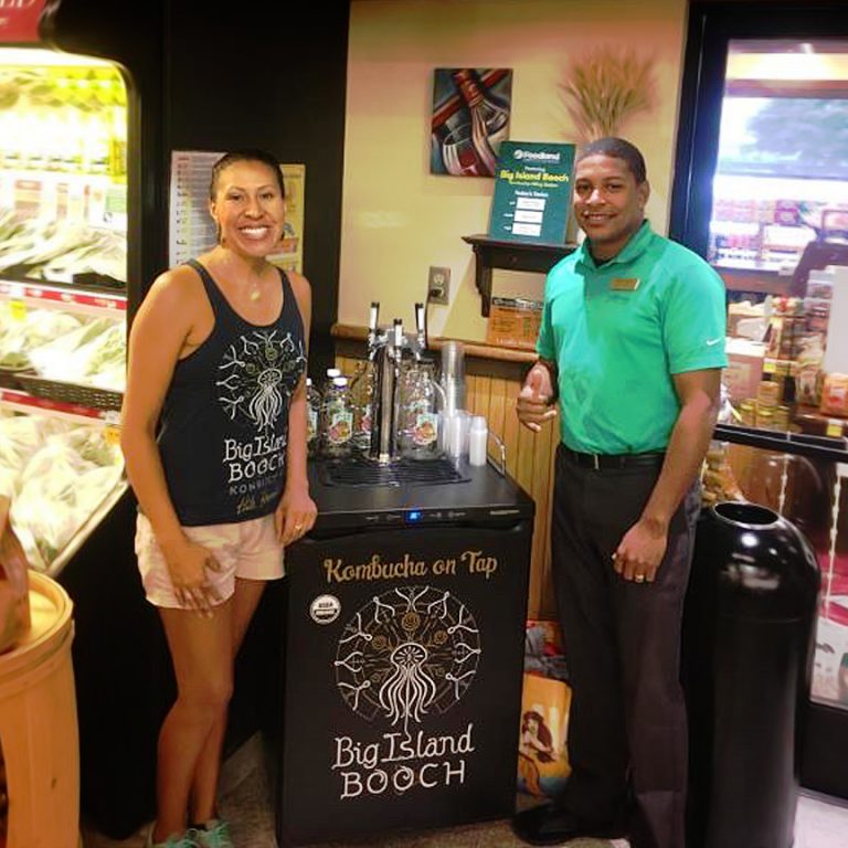 Big Island Booch kombucha on tap from a branded kegerator at a store in Kailua